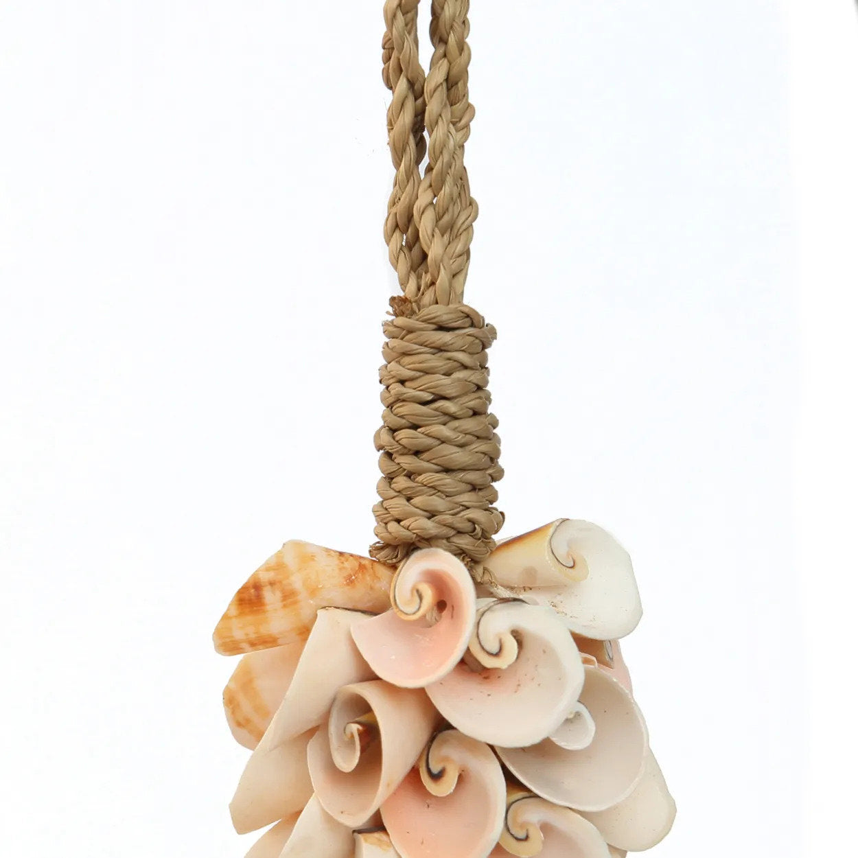 De schelp- en katoenen kwast - roze