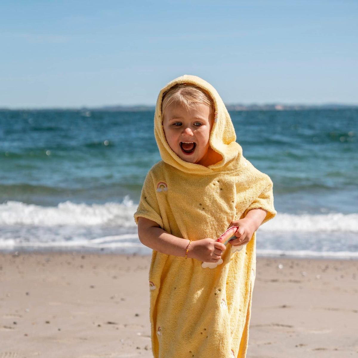 Geborduurde poncho GOTS – Unicorn Shores