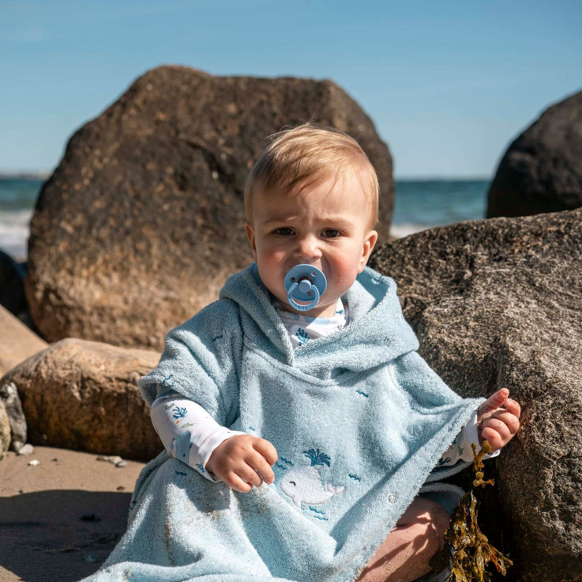 Geborduurde poncho GOTS – Walvisverhalen van Christian
