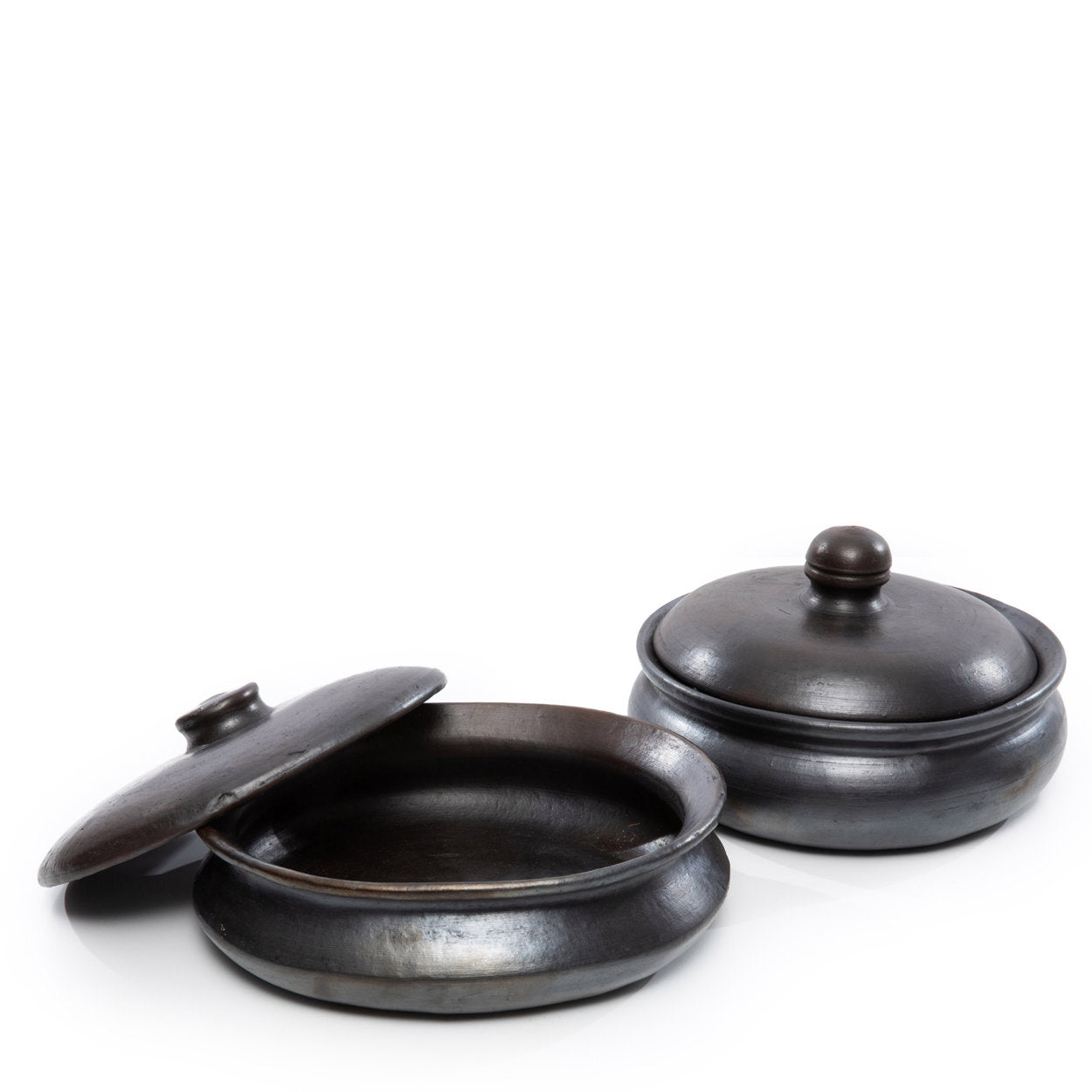 De verbrande curry-pot - zwart