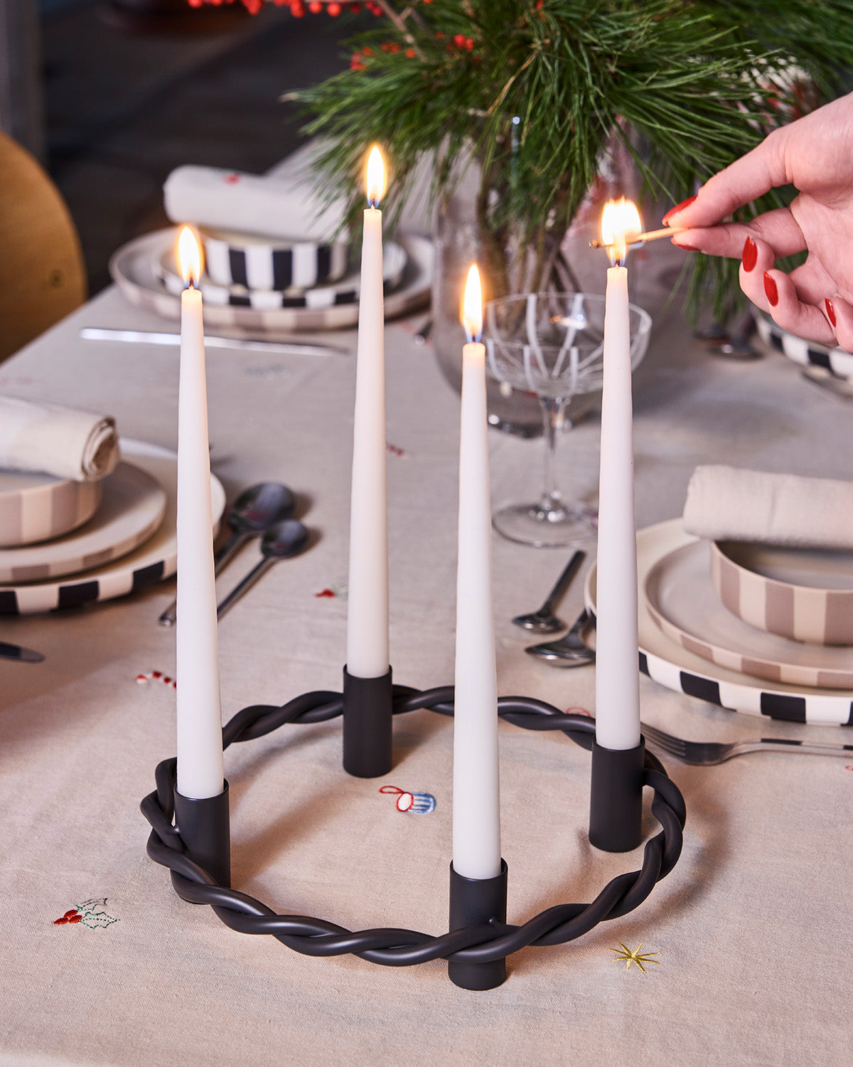 Rustgevende adventskandelaar